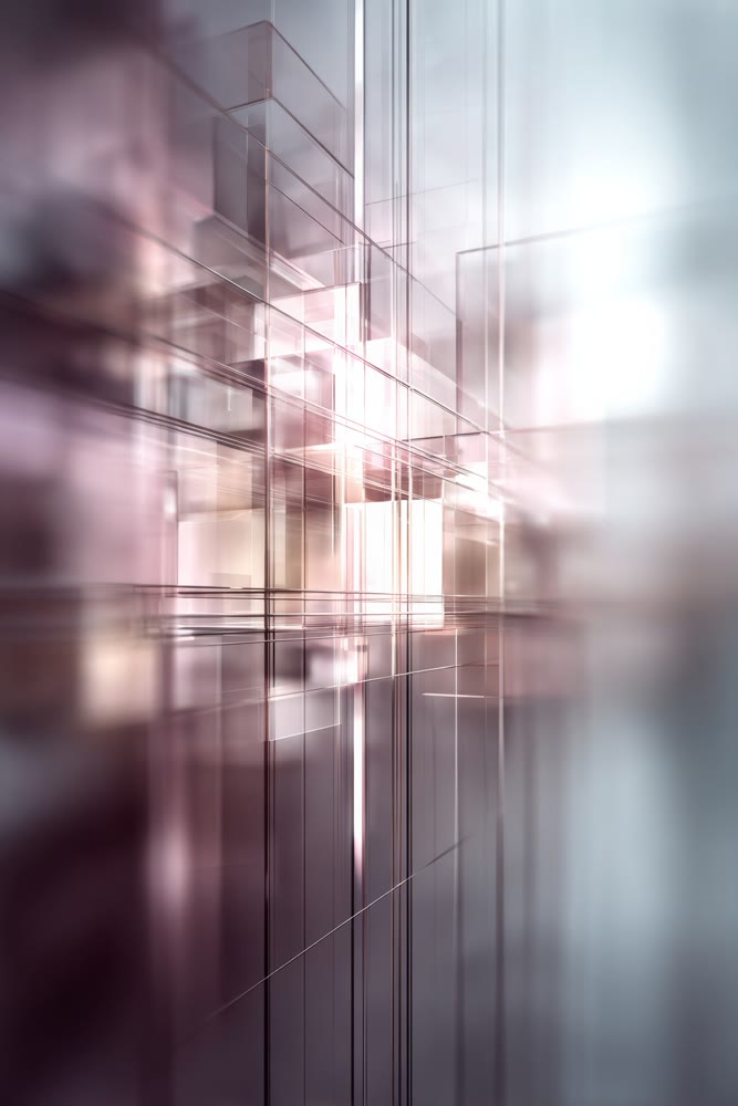 Sleek abstract architecture composed of glass cubes with muted colors and reflective surfaces